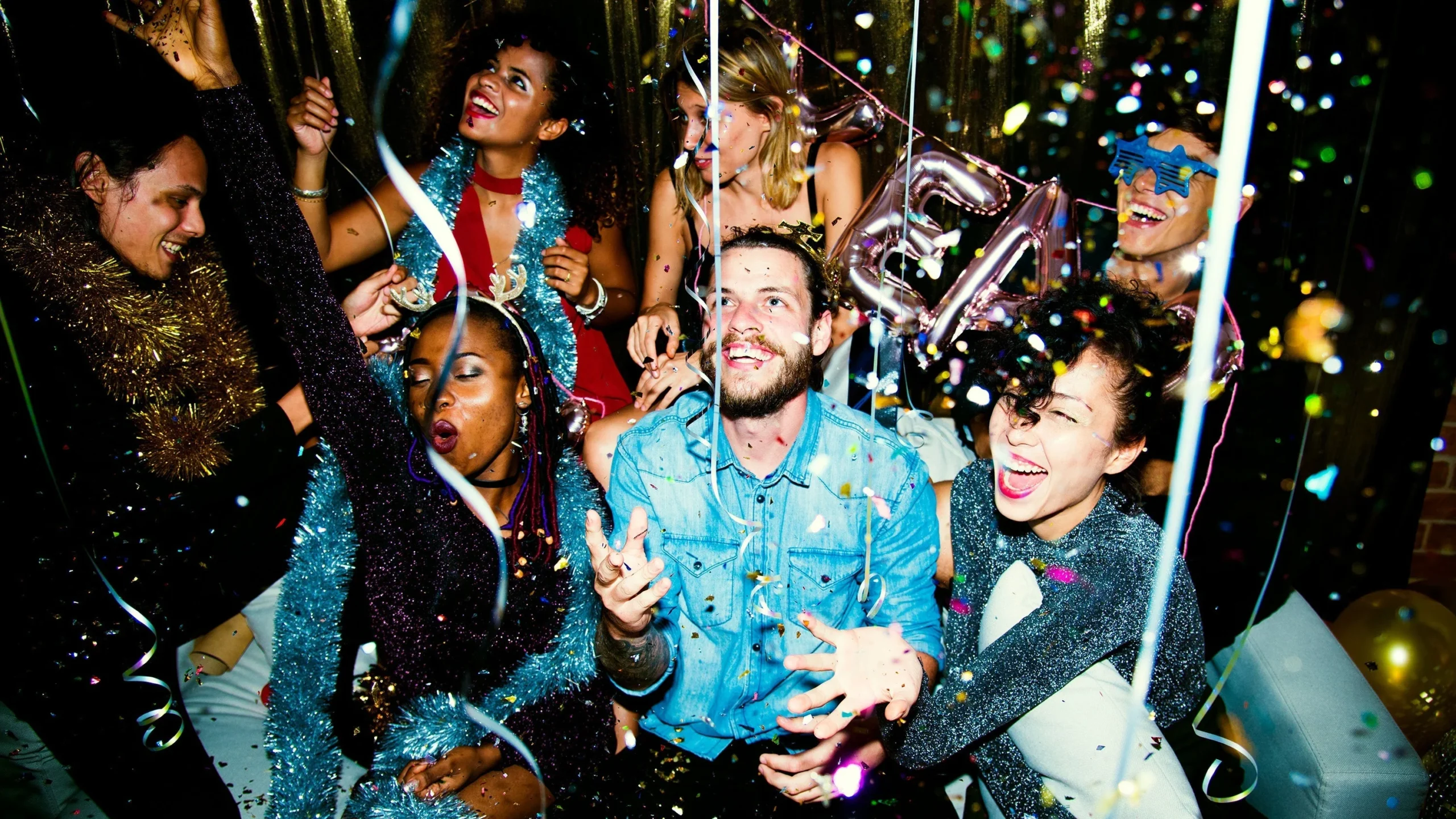 Birthday party limo service celebration with festive confetti and nightlife energy